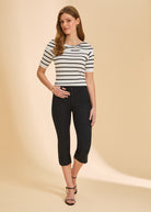 Front view of black crop pants with high-rise fit and slim silhouette by French Dressing Jeans (FDJ)