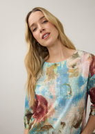 Close-up of vibrant pastel Henley top focusing on pattern and neckline by French Dressing Jeans (FDJ)