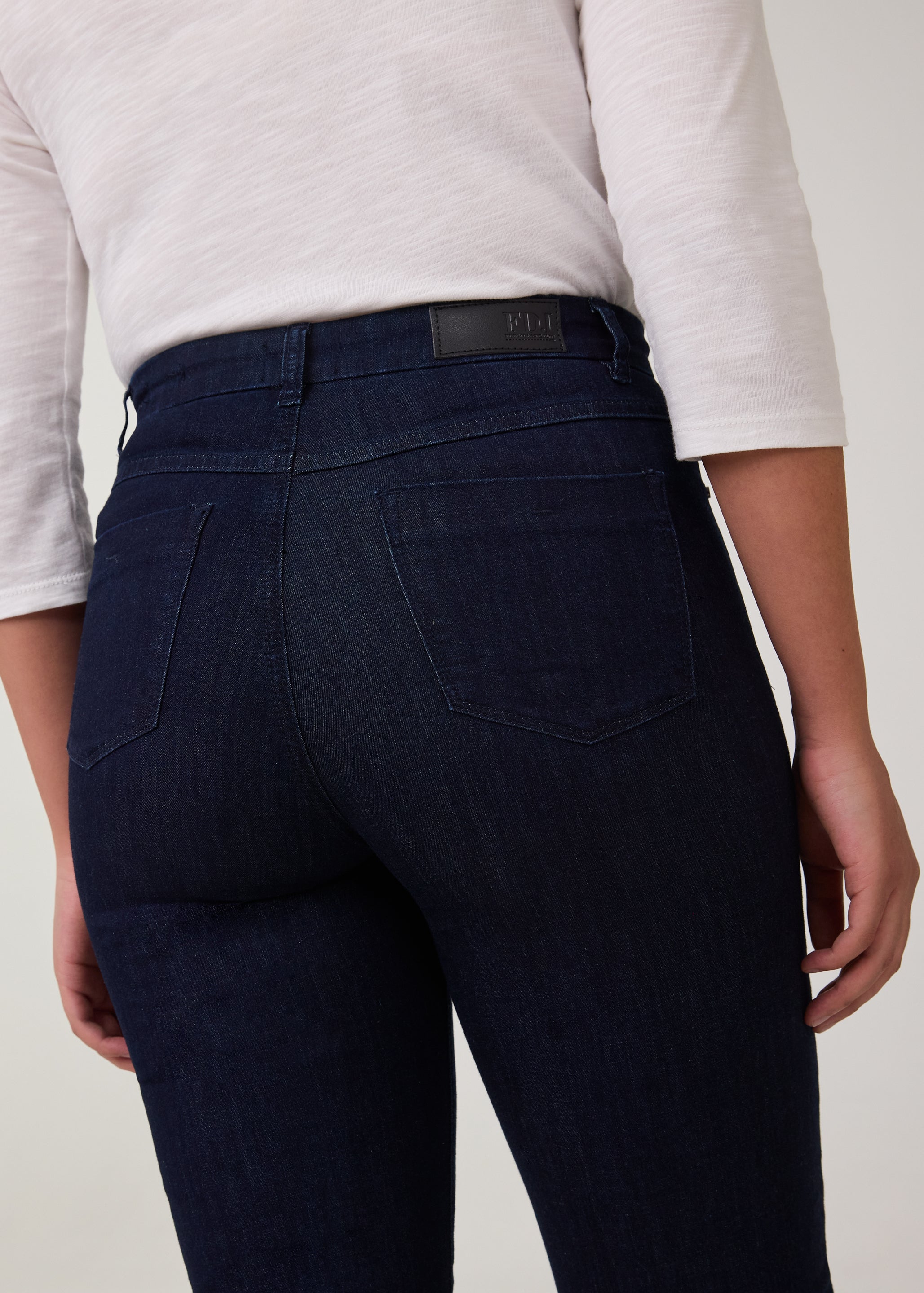 Close-up of back pocket detail on dark Delight jeans by French Dressing Jeans (FDJ)