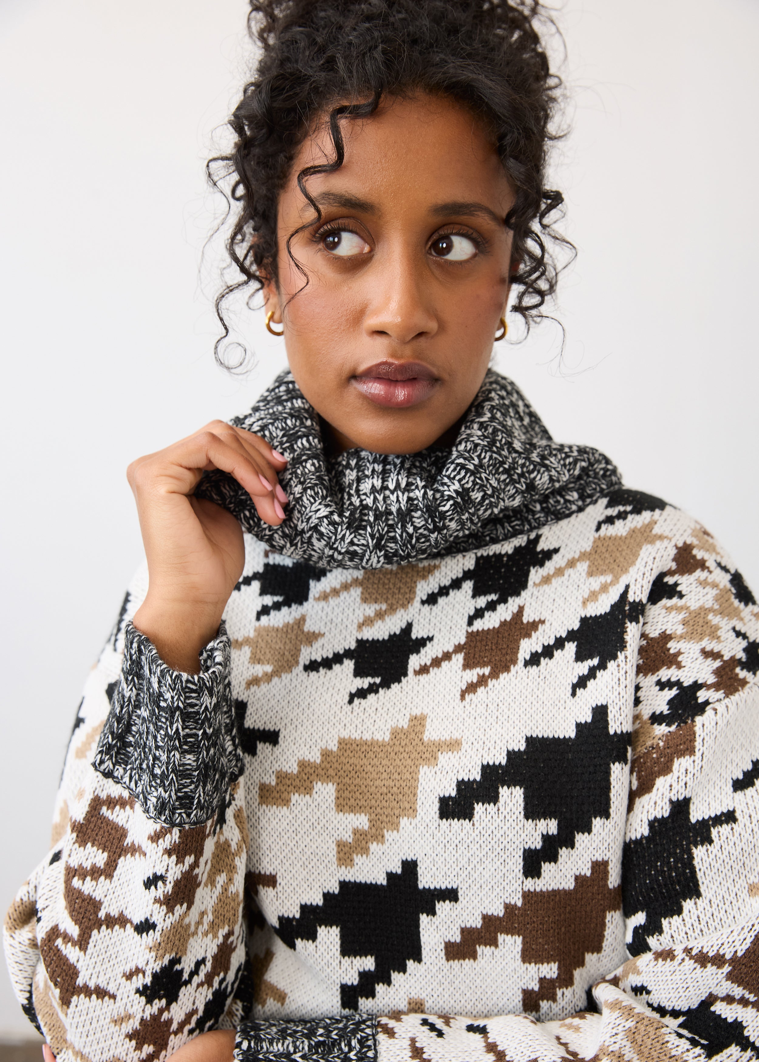 Detailed view of patterned sweater focusing on neckline and texture by French Dressing Jeans (FDJ)