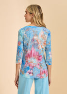 Back view of blue floral top showcasing 3/4 sleeves and relaxed fit by French Dressing Jeans (FDJ)
