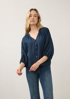 Front view of navy blouse with colorful buttons and V-neck by French Dressing Jeans (FDJ)
