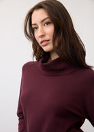 Close-up of cowl neck detail on burgundy sweater by French Dressing Jeans (FDJ)