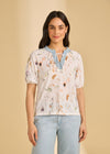Front view of 3/4 sleeve embellished top in Delicate showing floral print and V-neck detail by French Dressing Jeans (FDJ)