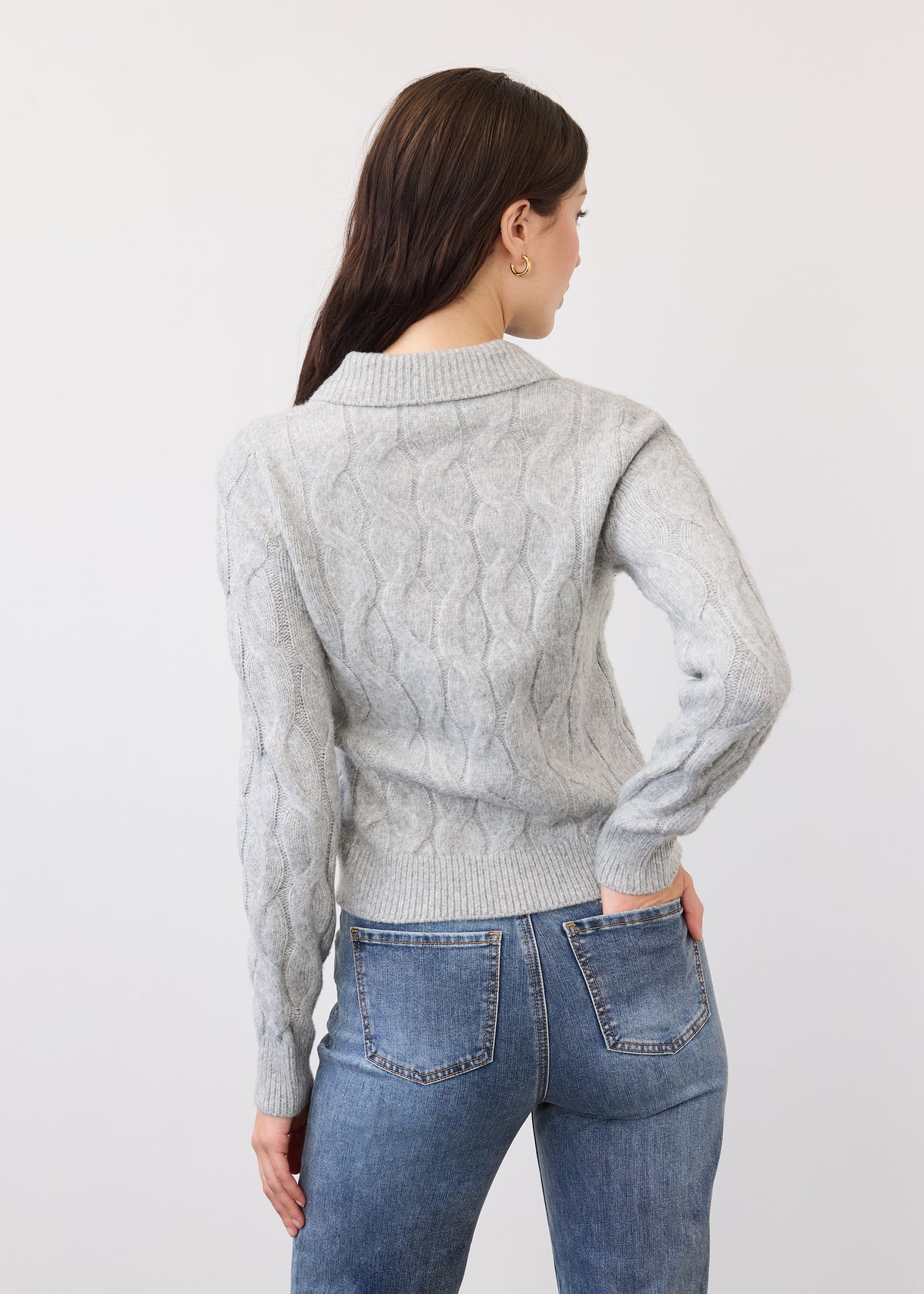 Back view of gray cabled cardigan showing textured knit pattern and ribbed hem by French Dressing Jeans (FDJ)