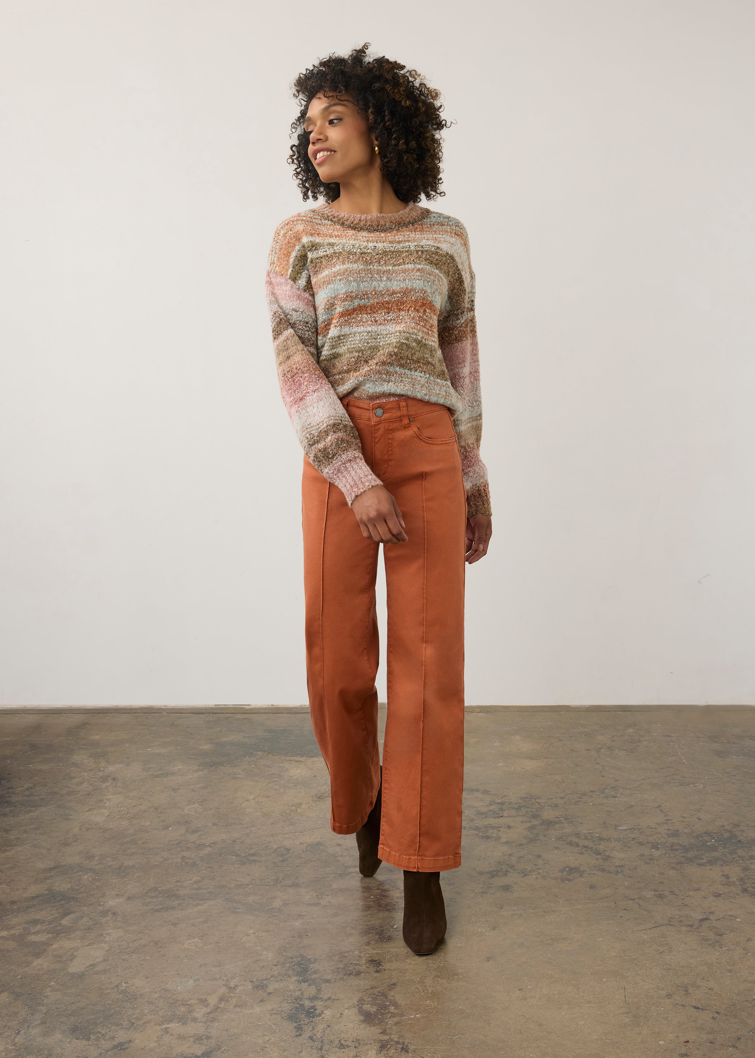 Full view of natural spacedye boucle sweater paired with orange pants by French Dressing Jeans (FDJ)
