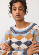 Close-up of printed sweater highlighting sparkle yarn and boat neck by French Dressing Jeans (FDJ)