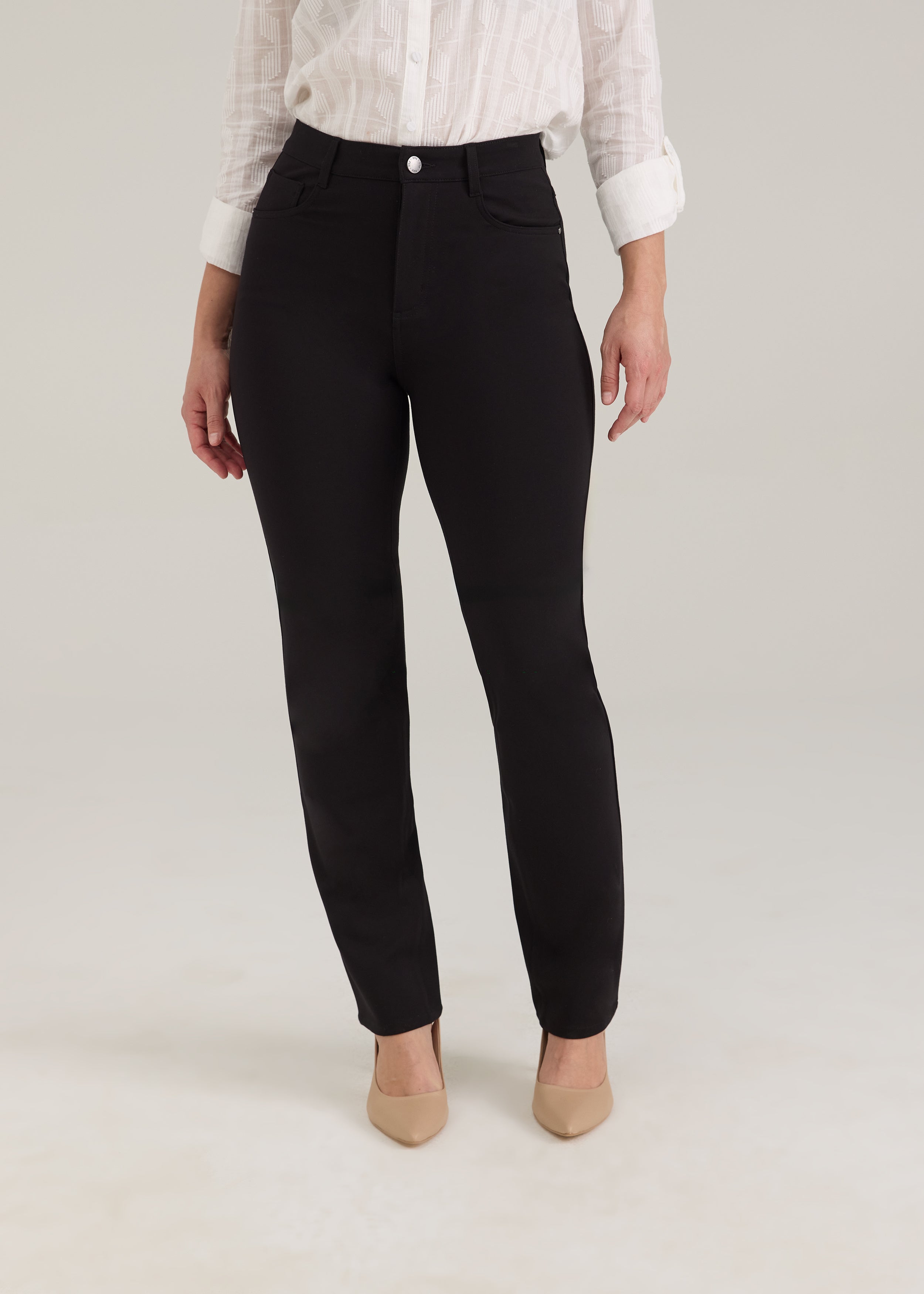 Front view of black pants with button closure and front pockets by French Dressing Jeans (FDJ)