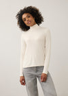 Front view of cream turtleneck top with long sleeves and soft stretch fabric by French Dressing Jeans (FDJ)