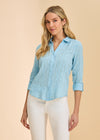 Detail view of light blue textured shirt with button front and rolled sleeves by French Dressing Jeans (FDJ)