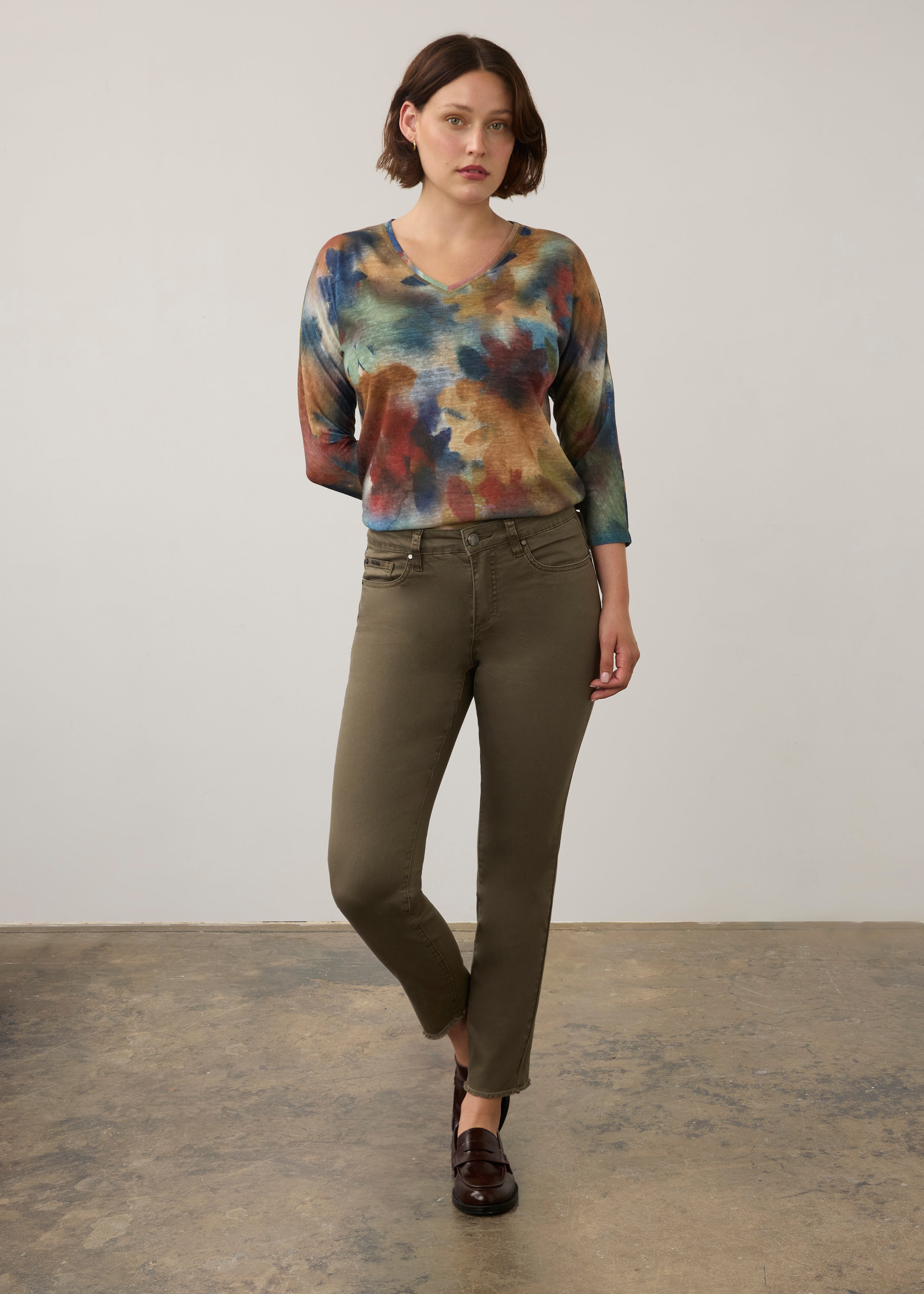 Full body view of watercolor Henley top with olive pants and loafers by French Dressing Jeans (FDJ)