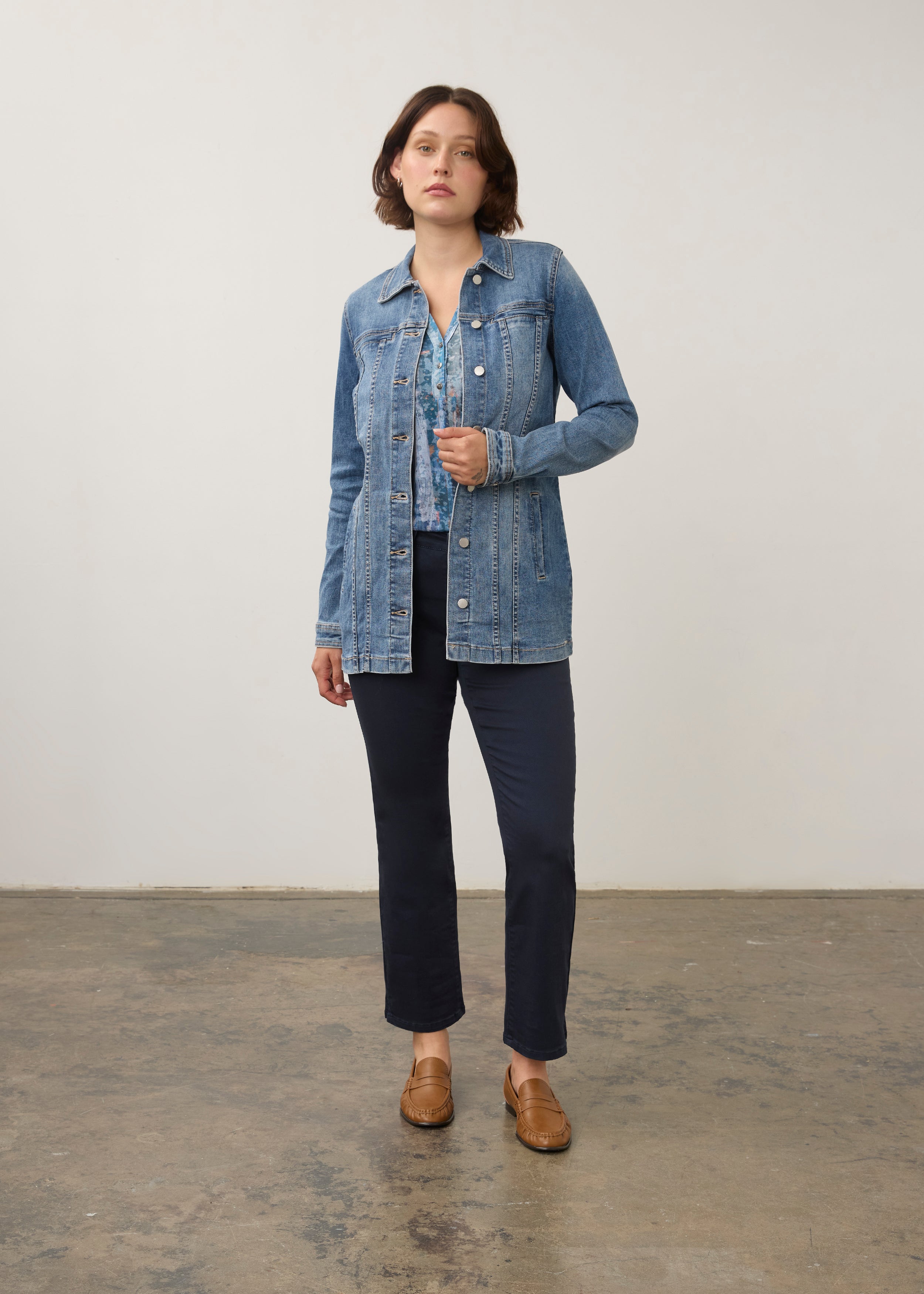 Full view of medium wash denim jacket paired with dark pants and loafers by French Dressing Jeans (FDJ) par French Dressing Jeans (FDJ)