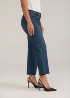 Side profile of Olivia denim in dark wash highlighting wide ankle and mid-rise waist by French Dressing Jeans (FDJ)
