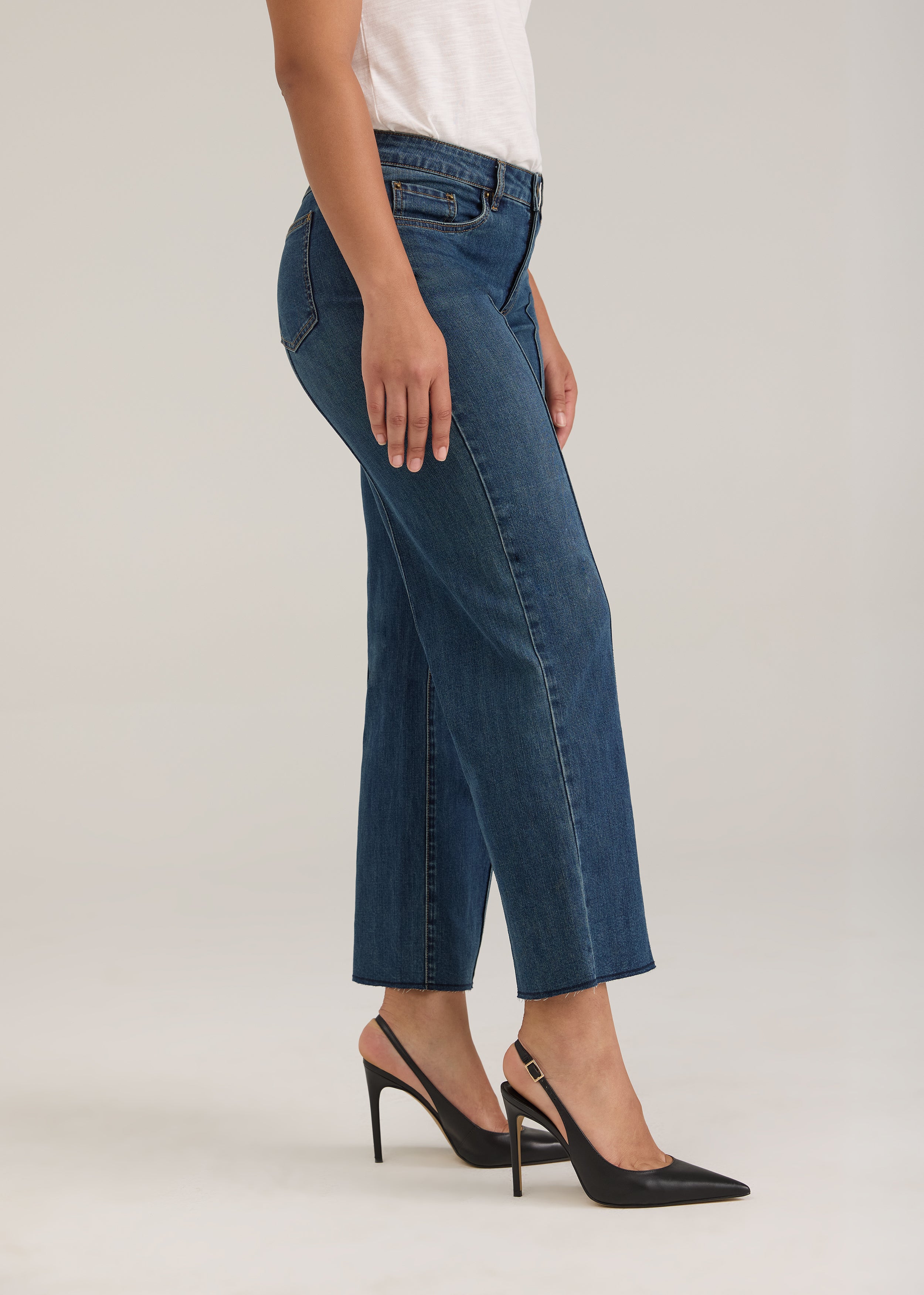Side profile of Olivia denim in dark wash highlighting wide ankle and mid-rise waist by French Dressing Jeans (FDJ)