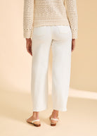 Back view of ivory Suzanne jeans with patch pockets paired with crochet top by French Dressing Jeans (FDJ)