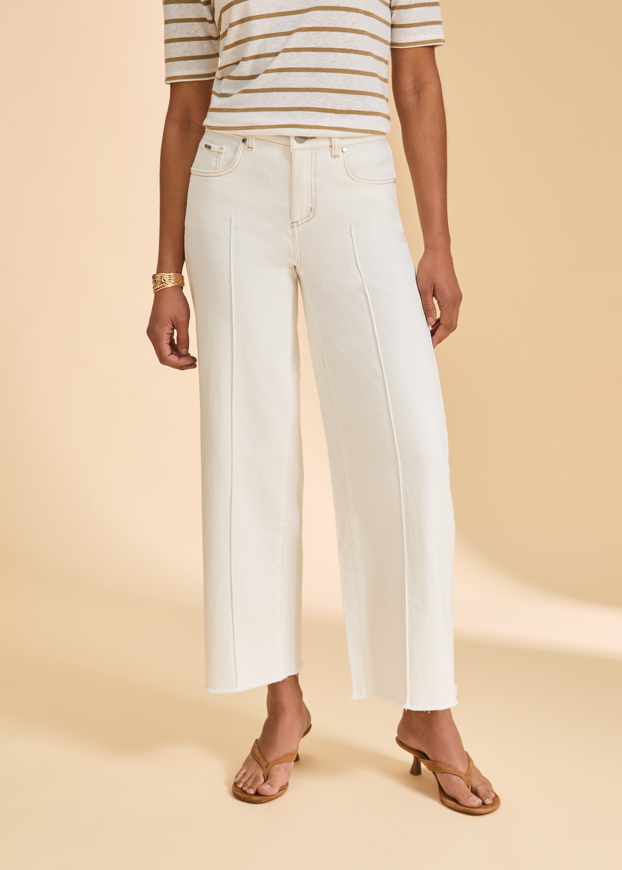 Close-up front view of ivory denim emphasizing seam detail and straight leg by French Dressing Jeans (FDJ)