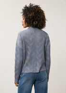 Back view of blue textured top showing seamless design by French Dressing Jeans (FDJ)