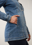 Side view of medium wash denim jacket showing side seam pocket detail by French Dressing Jeans (FDJ) par French Dressing Jeans (FDJ)