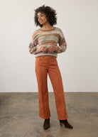 Full view of terracotta wide-leg denim styled with pastel sweater by French Dressing Jeans (FDJ) par French Dressing Jeans (FDJ)