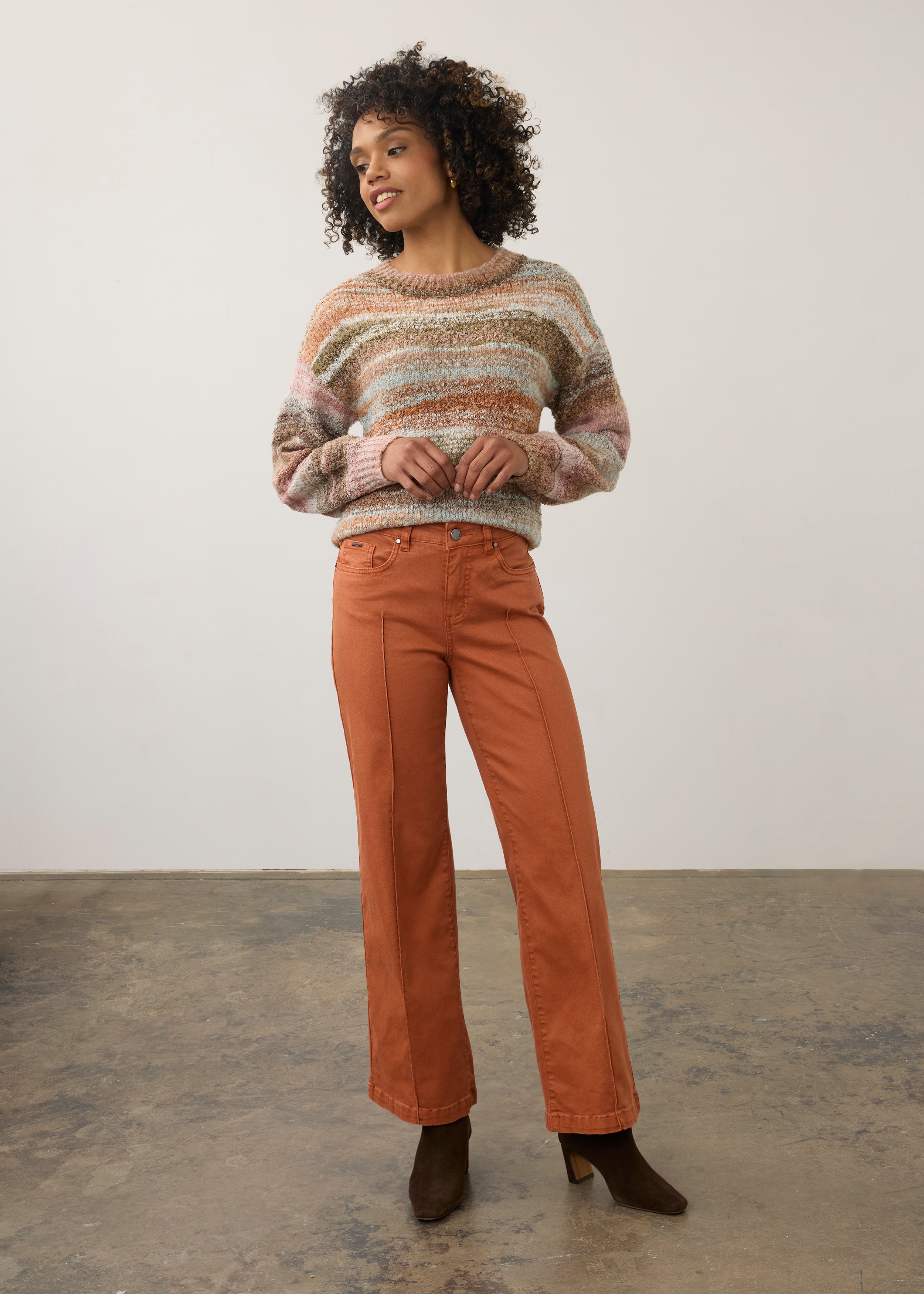Full view of terracotta wide-leg denim styled with pastel sweater by French Dressing Jeans (FDJ) par French Dressing Jeans (FDJ)