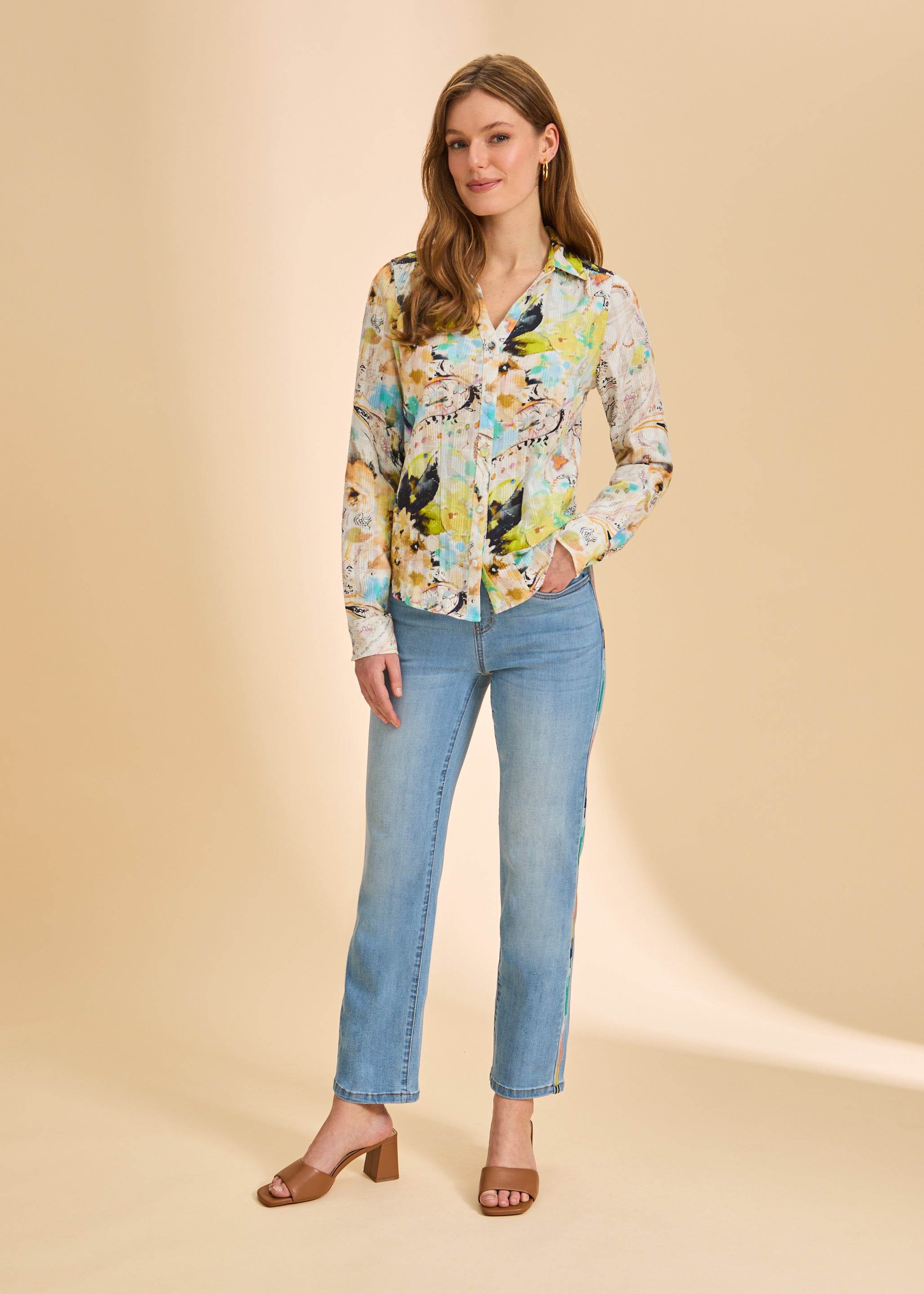 Full view of abstract floral shirt styled with light blue jeans by French Dressing Jeans (FDJ)
