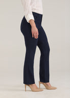 Side profile of navy pants highlighting leg silhouette and front pockets by French Dressing Jeans (FDJ)