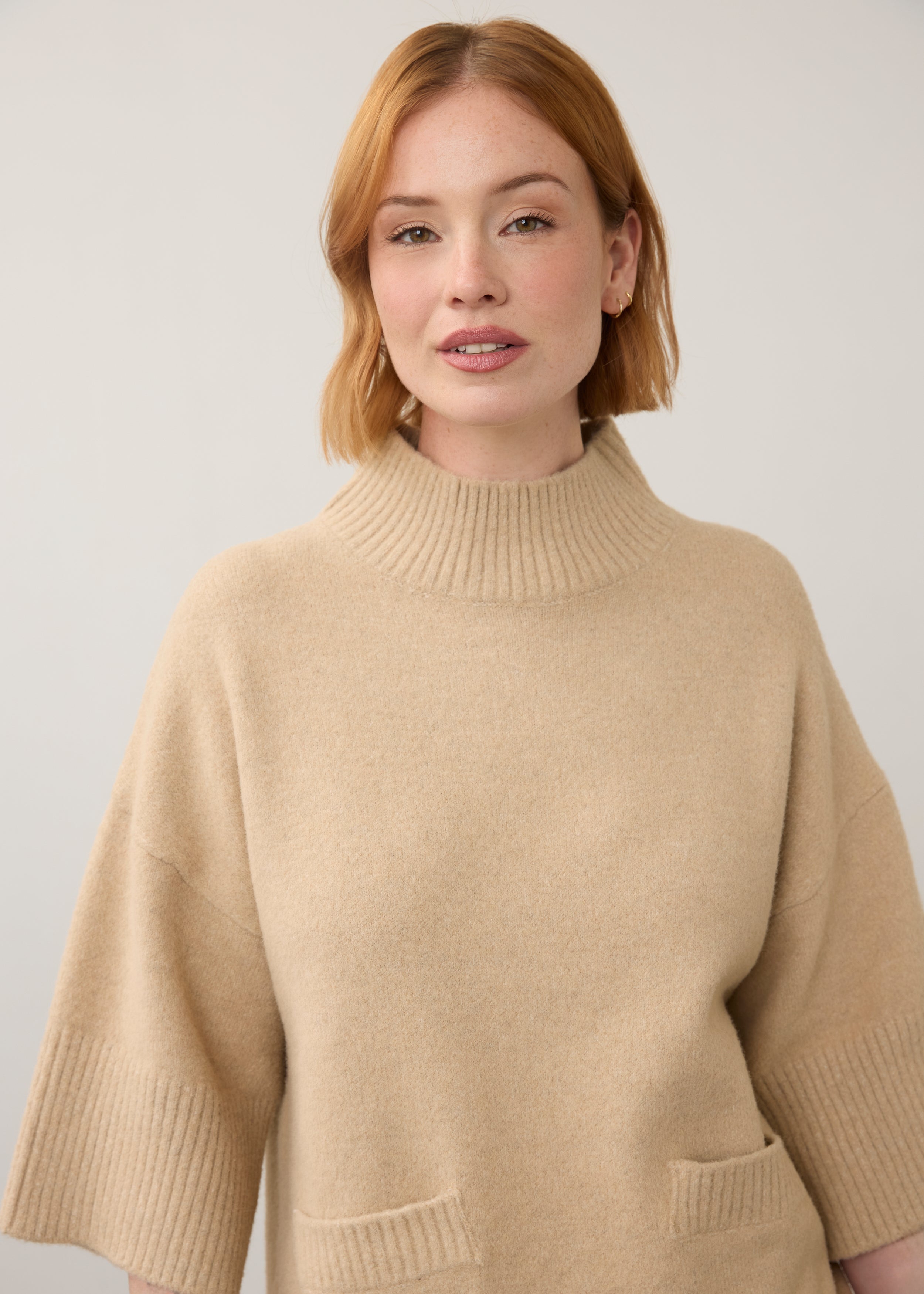 Close-up of beige tunic sweater focusing on ribbed neckline by French Dressing Jeans (FDJ)