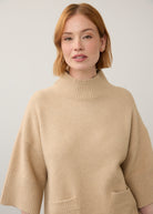 Close-up of beige tunic sweater focusing on ribbed neckline by French Dressing Jeans (FDJ)