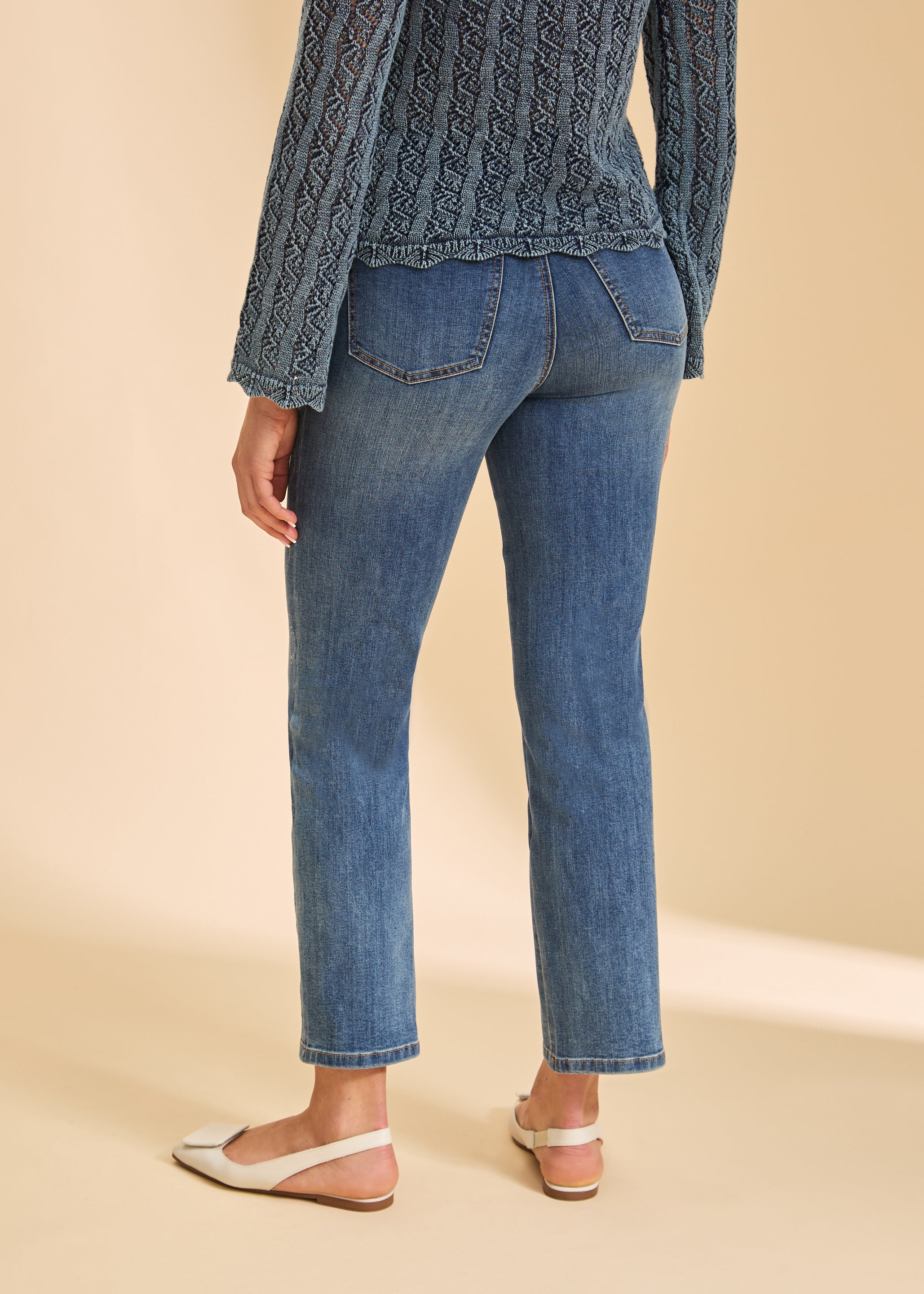Back view of indigo straight leg jeans featuring back patch pockets by French Dressing Jeans (FDJ)