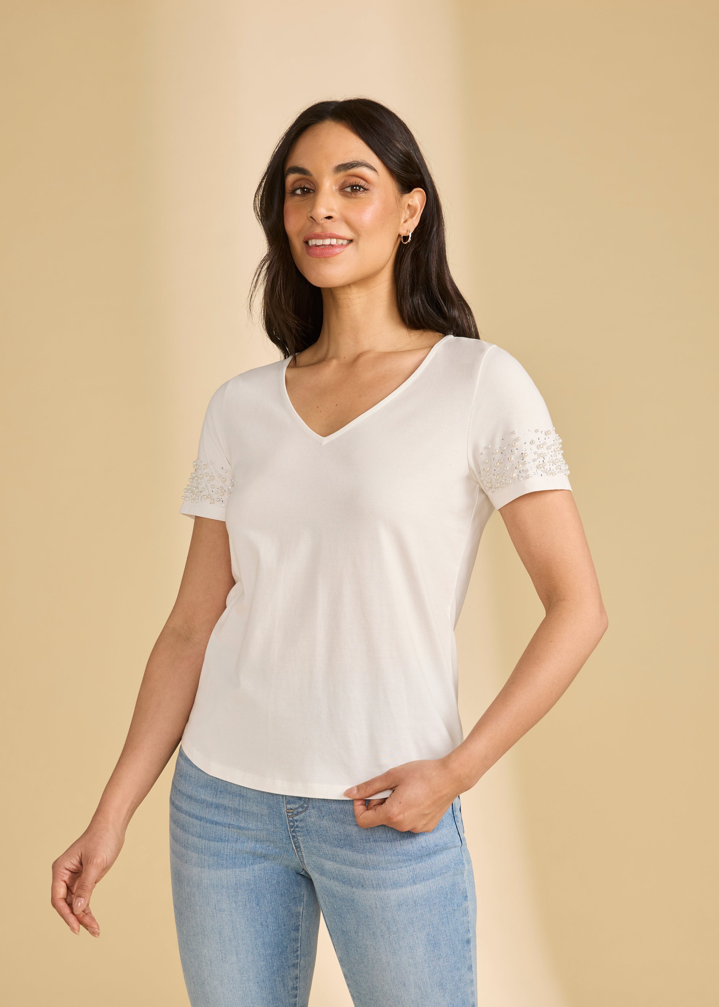 Front view of white V-neck top with pearl-trimmed short sleeves by French Dressing Jeans (FDJ)