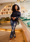 Front view of indigo jeans with diamond patterns and mid-rise fit by French Dressing Jeans (FDJ)