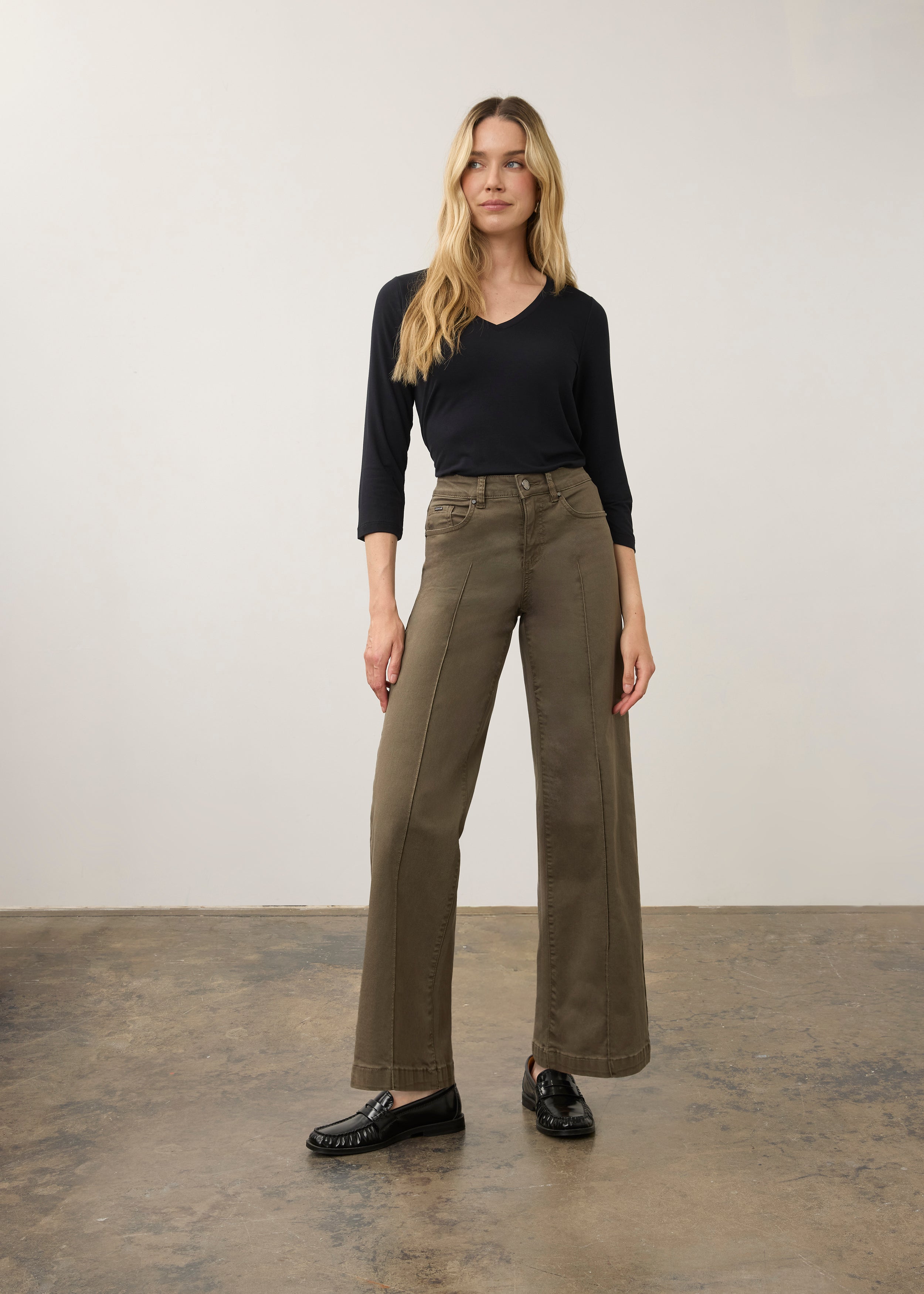 Full view of olive wide-leg denim paired with black top by French Dressing Jeans (FDJ) par French Dressing Jeans (FDJ)