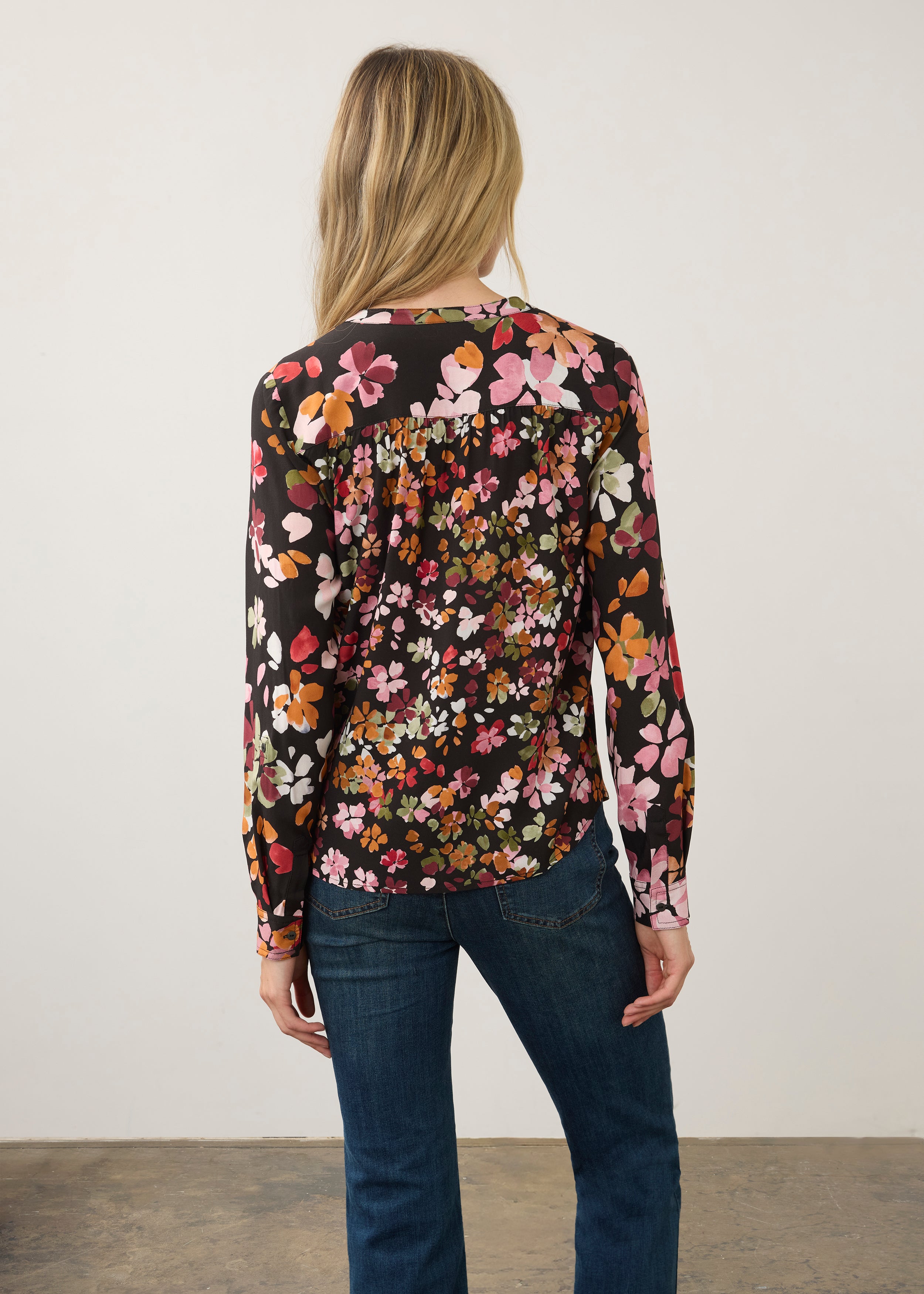 Back view of vibrant floral shirt highlighting long sleeves by French Dressing Jeans (FDJ)