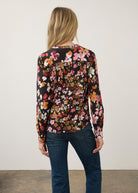 Back view of vibrant floral shirt highlighting long sleeves by French Dressing Jeans (FDJ)