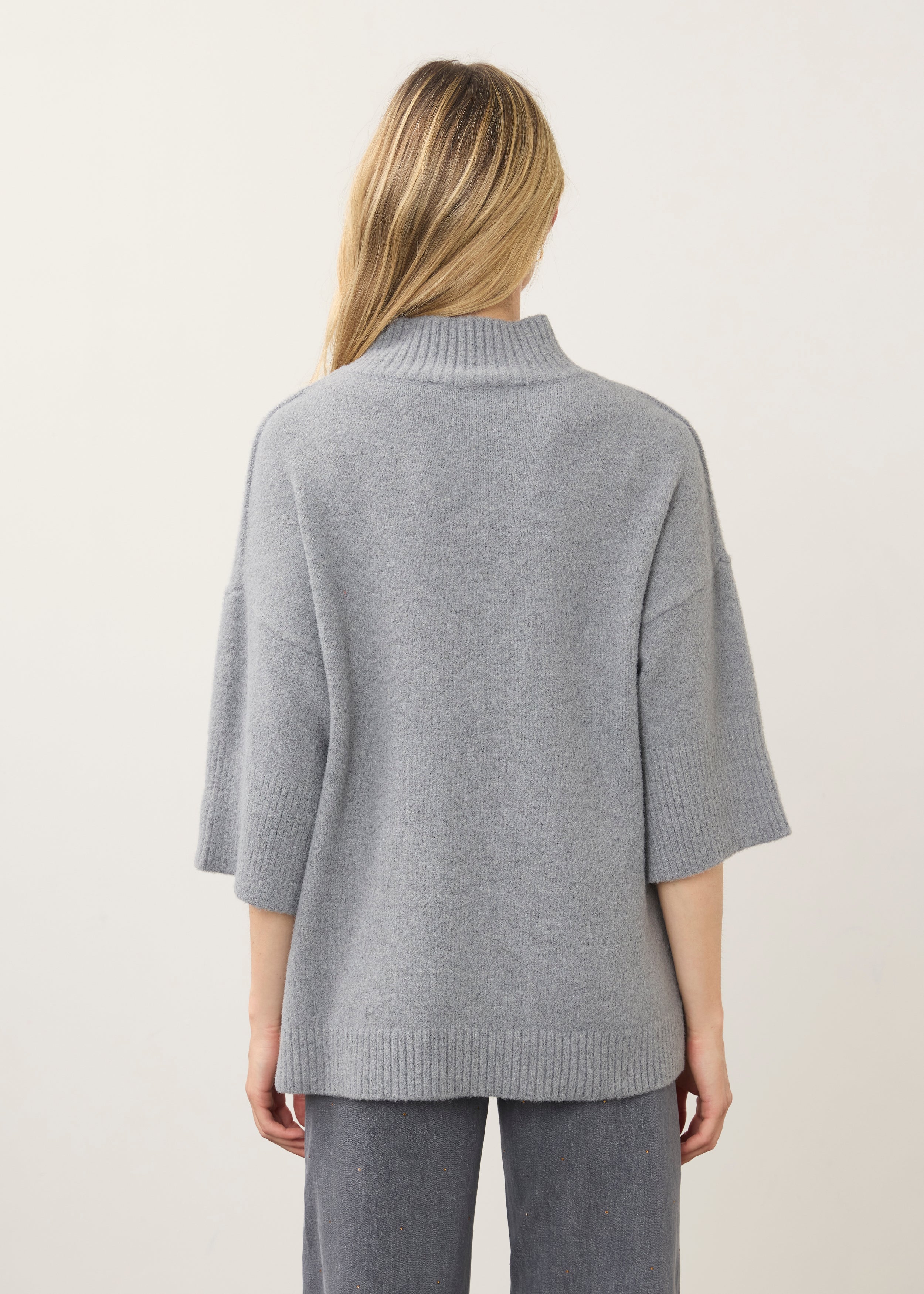 Back view of grey tunic sweater showcasing relaxed fit by French Dressing Jeans (FDJ)
