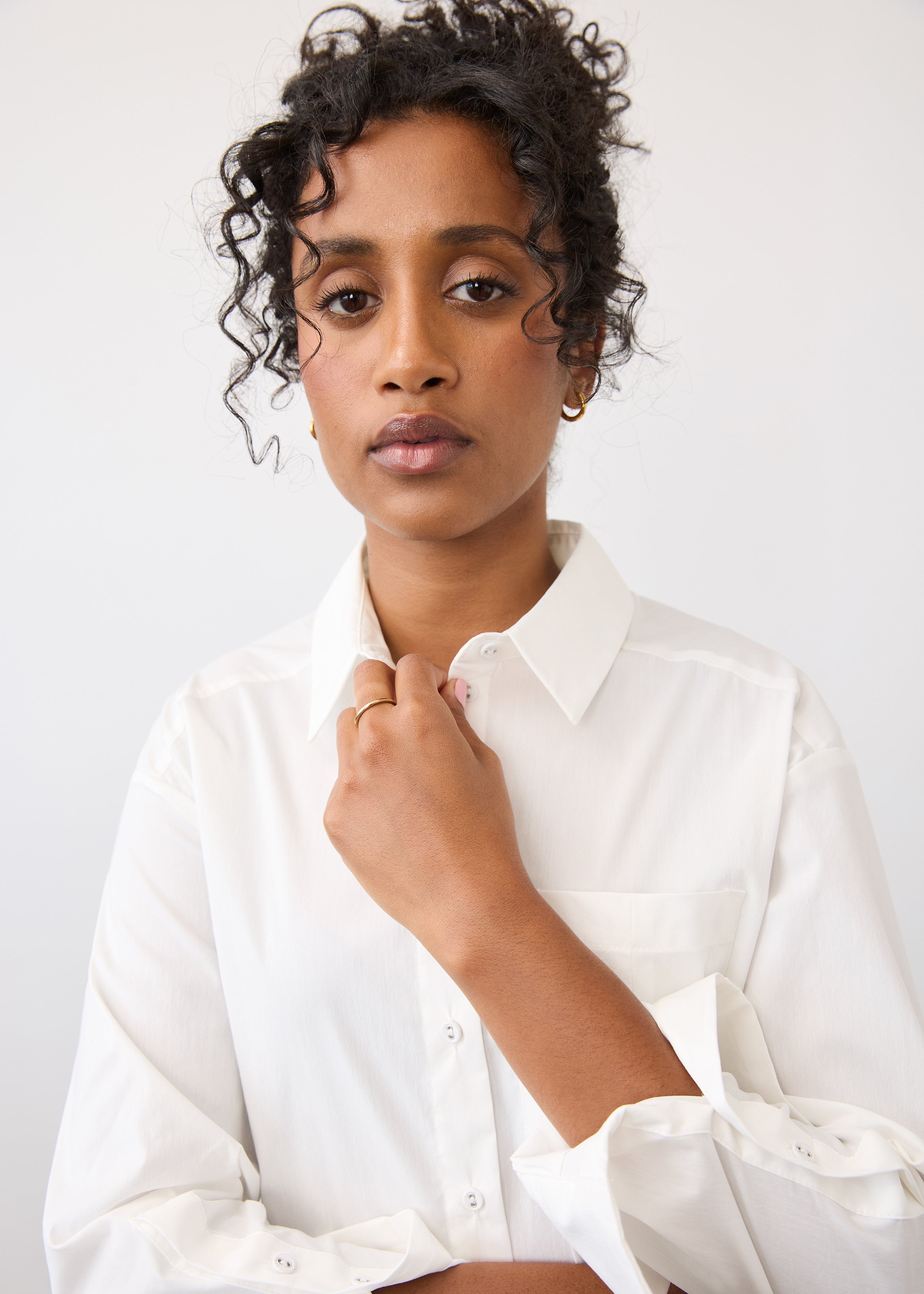 Close-up of white shirt highlighting collar and button details by French Dressing Jeans (FDJ)