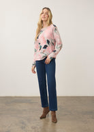 Model wearing long sleeve printed sweater in De Winter Pink paired with jeans by French Dressing Jeans (FDJ)