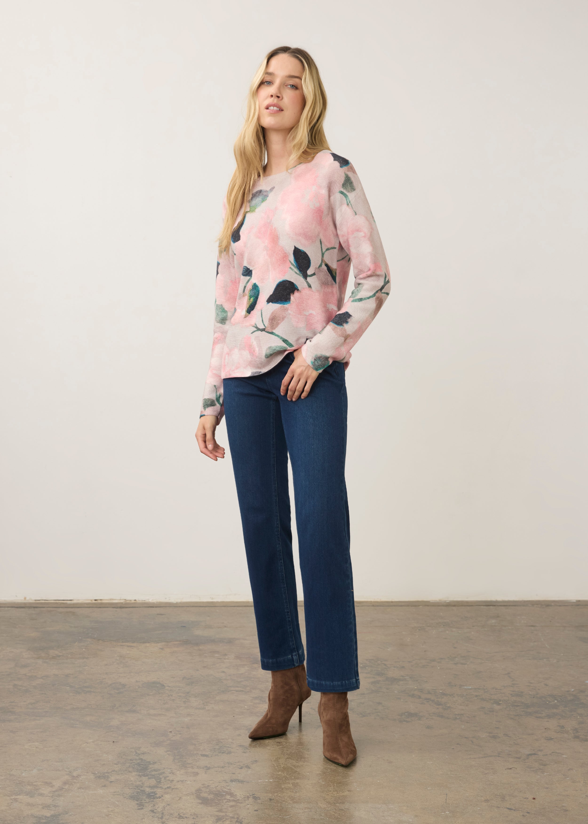 Model wearing long sleeve printed sweater in De Winter Pink paired with jeans by French Dressing Jeans (FDJ)