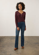 Full view of burgundy sweater with blue jeans outfit by French Dressing Jeans (FDJ)