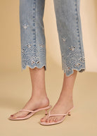 Detail shot of floral embroidery on ocean denim jeans by French Dressing Jeans (FDJ)