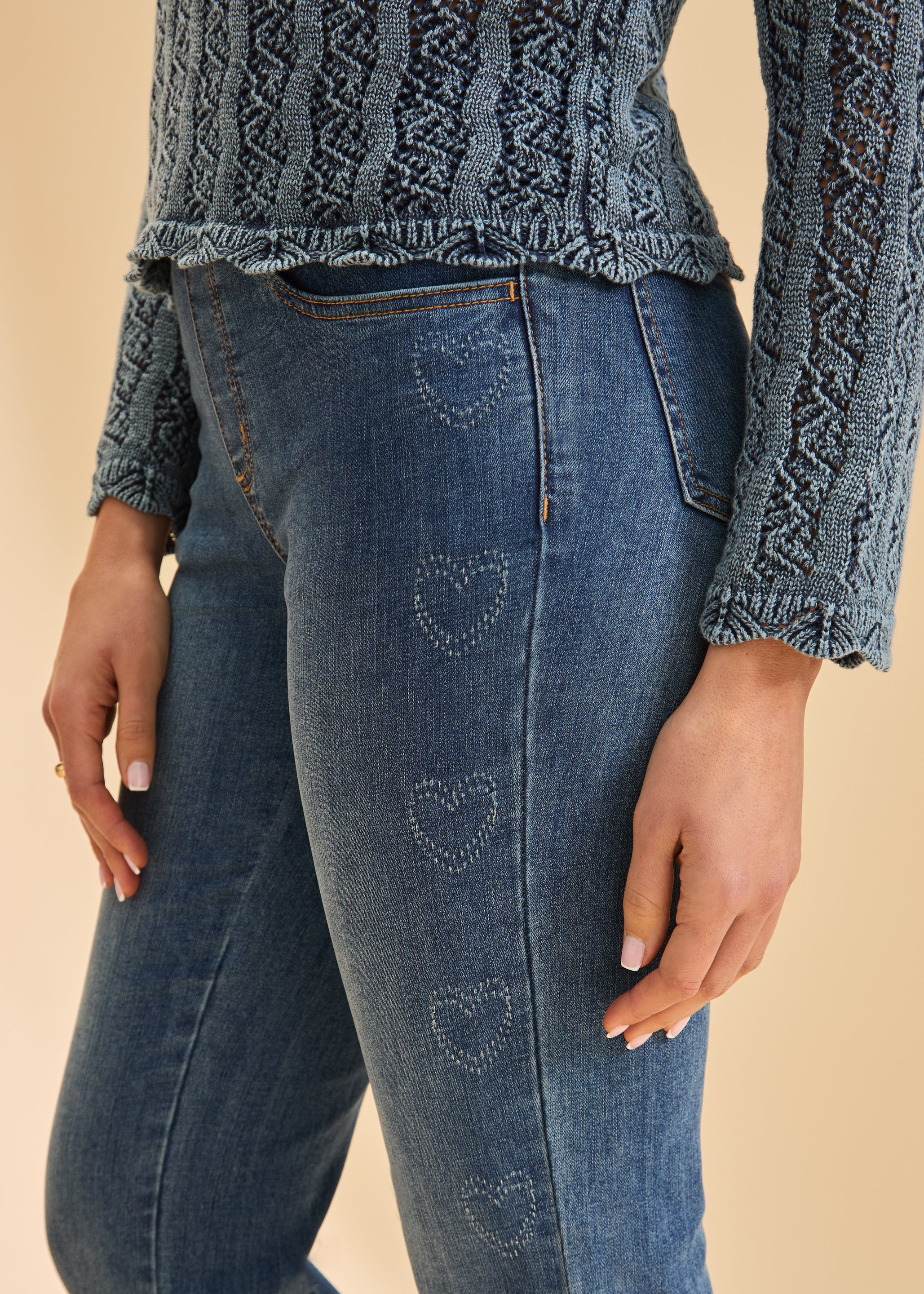 Close-up of heart pattern detail on indigo straight leg jeans by French Dressing Jeans (FDJ)