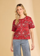 Front view of red Polynesian block print top featuring short sleeves and elegant print by French Dressing Jeans (FDJ)