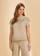 Front view of tan and white striped short-sleeve sweater with relaxed fit by French Dressing Jeans (FDJ)