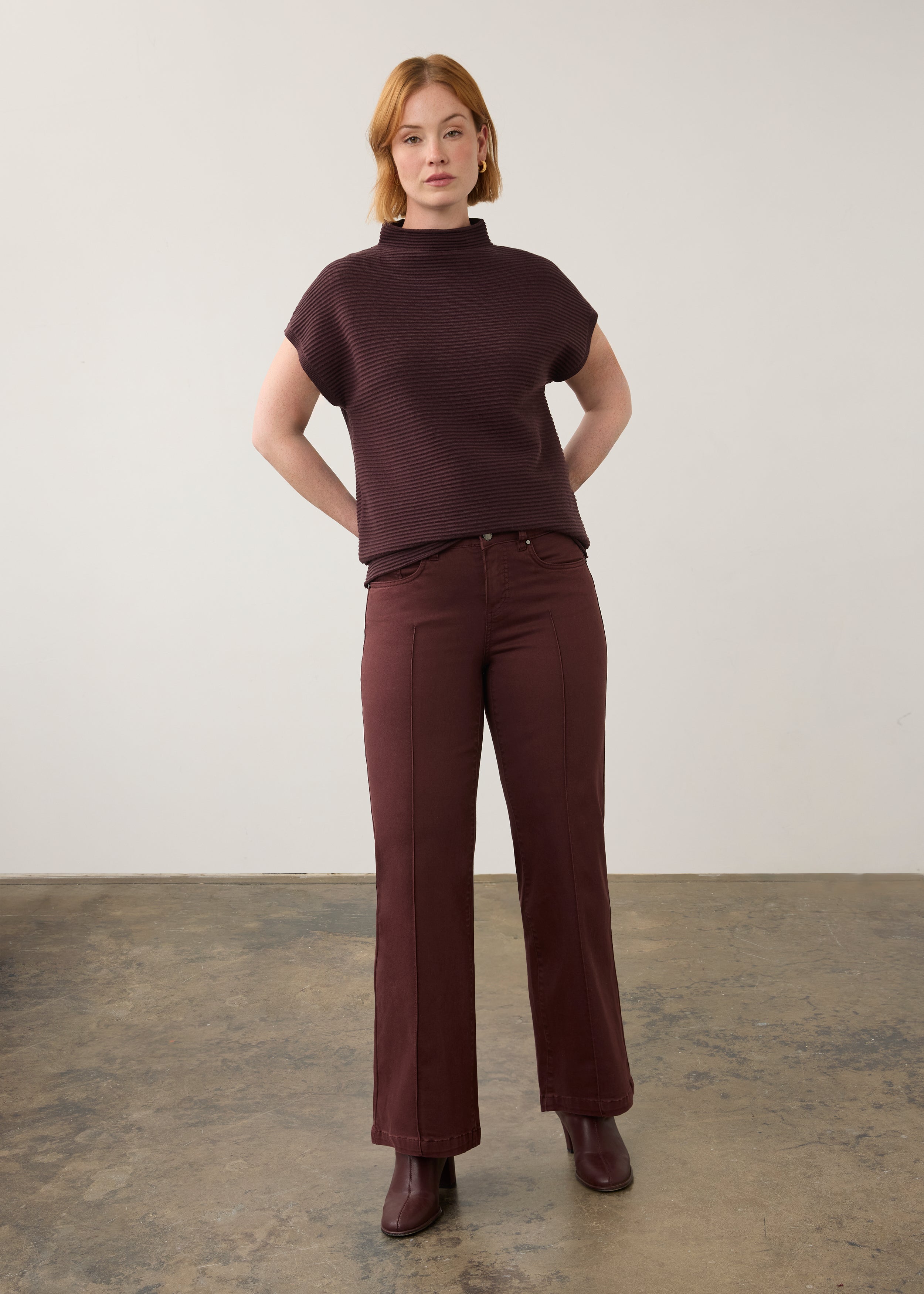 Model in burgundy ribbed top paired with matching pants, full outfit view by French Dressing Jeans (FDJ)