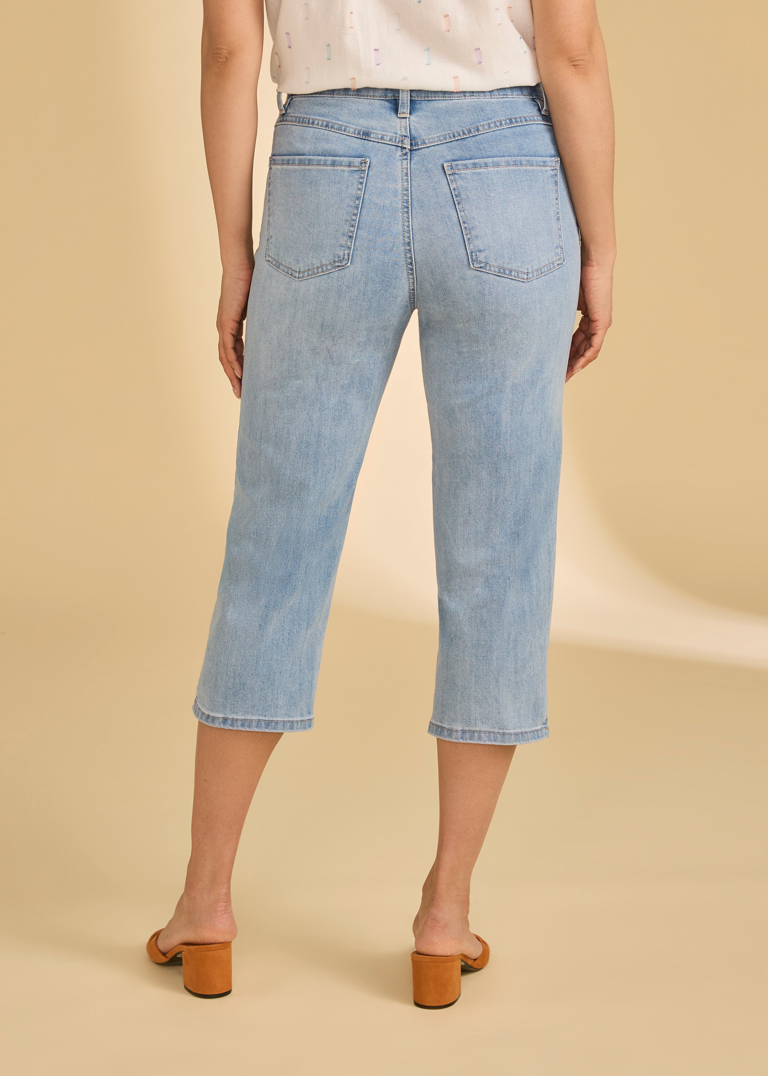 Back view of cropped jeans in indigo blue highlighting patch pockets by French Dressing Jeans (FDJ)