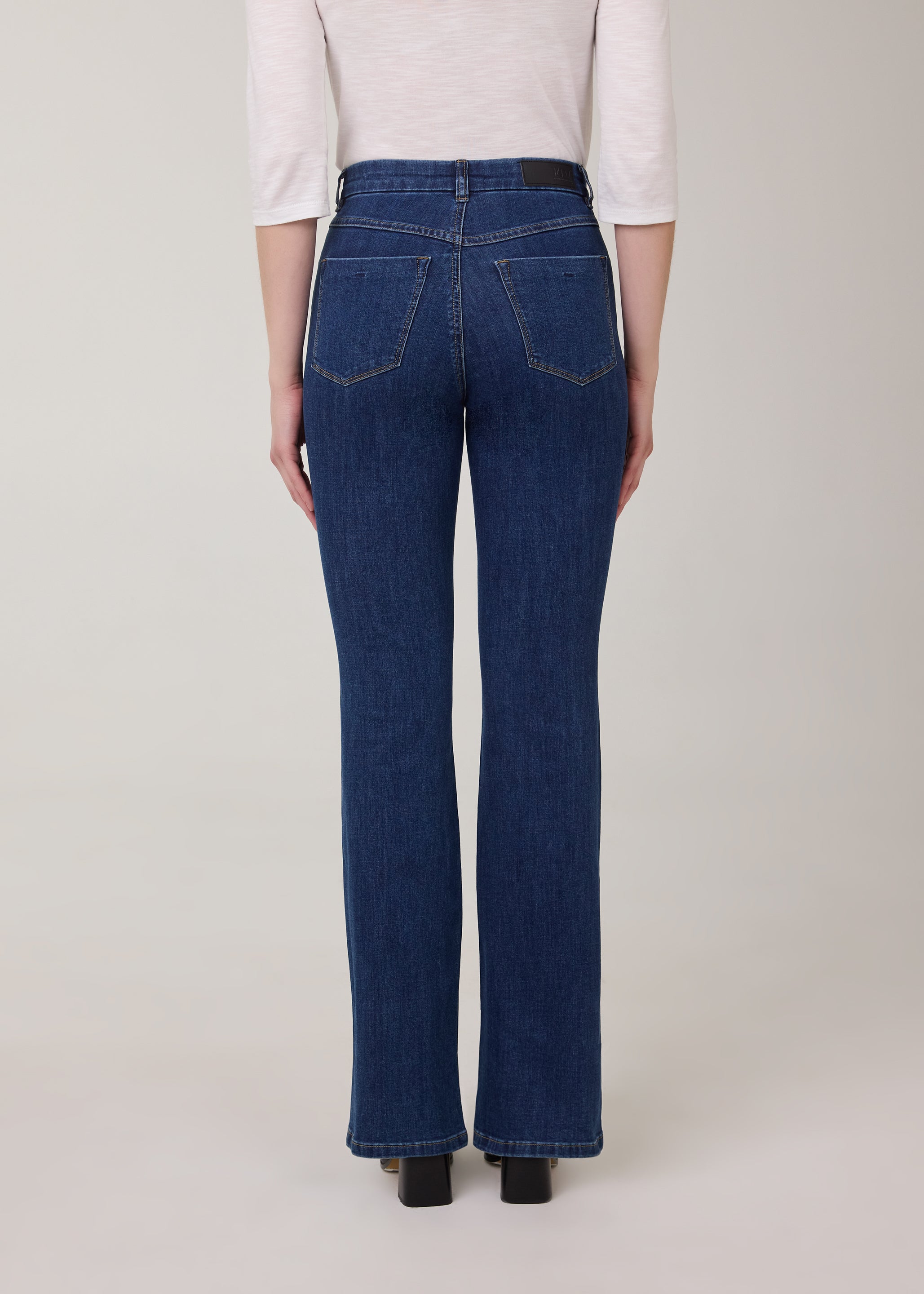 Back view of bootcut denim jeans in dark Delight color by French Dressing Jeans (FDJ)