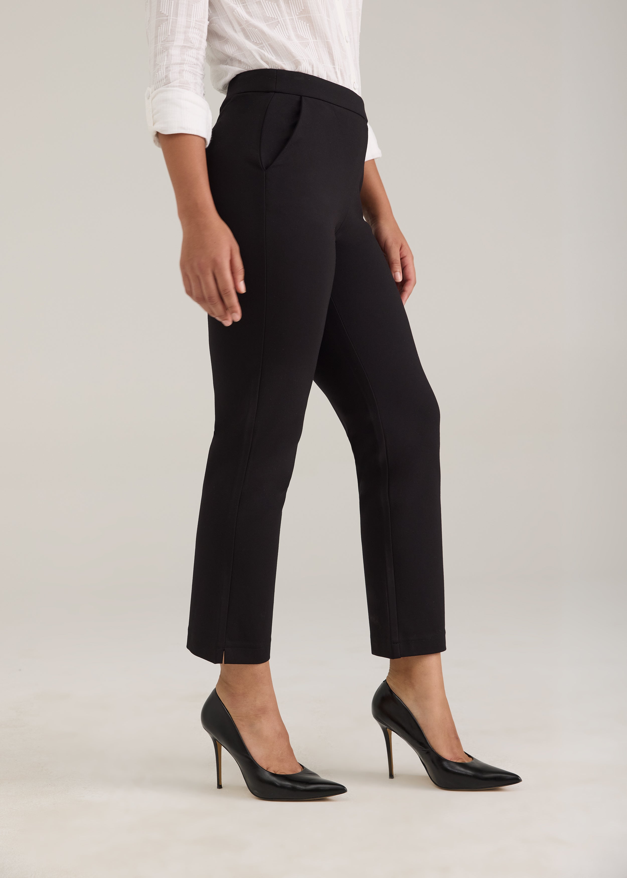 Side view of black Ponte pants highlighting straight ankle cut and front pockets by French Dressing Jeans (FDJ)