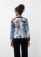 Back view of Indigo Gallery V-neck top displaying abstract print and long sleeves by French Dressing Jeans (FDJ)