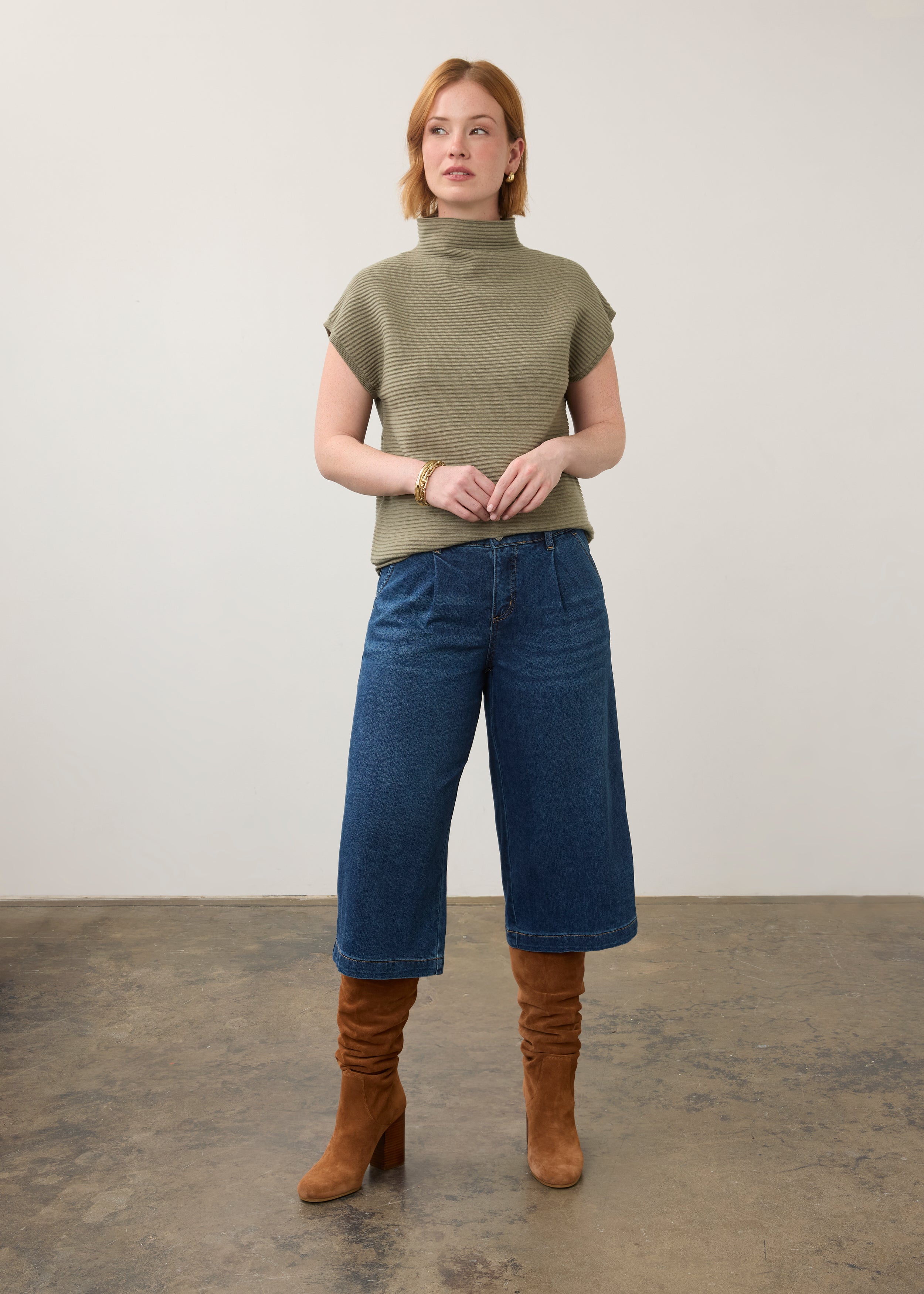 Model wearing olive green ribbed top with jeans, showcasing full outfit by French Dressing Jeans (FDJ)