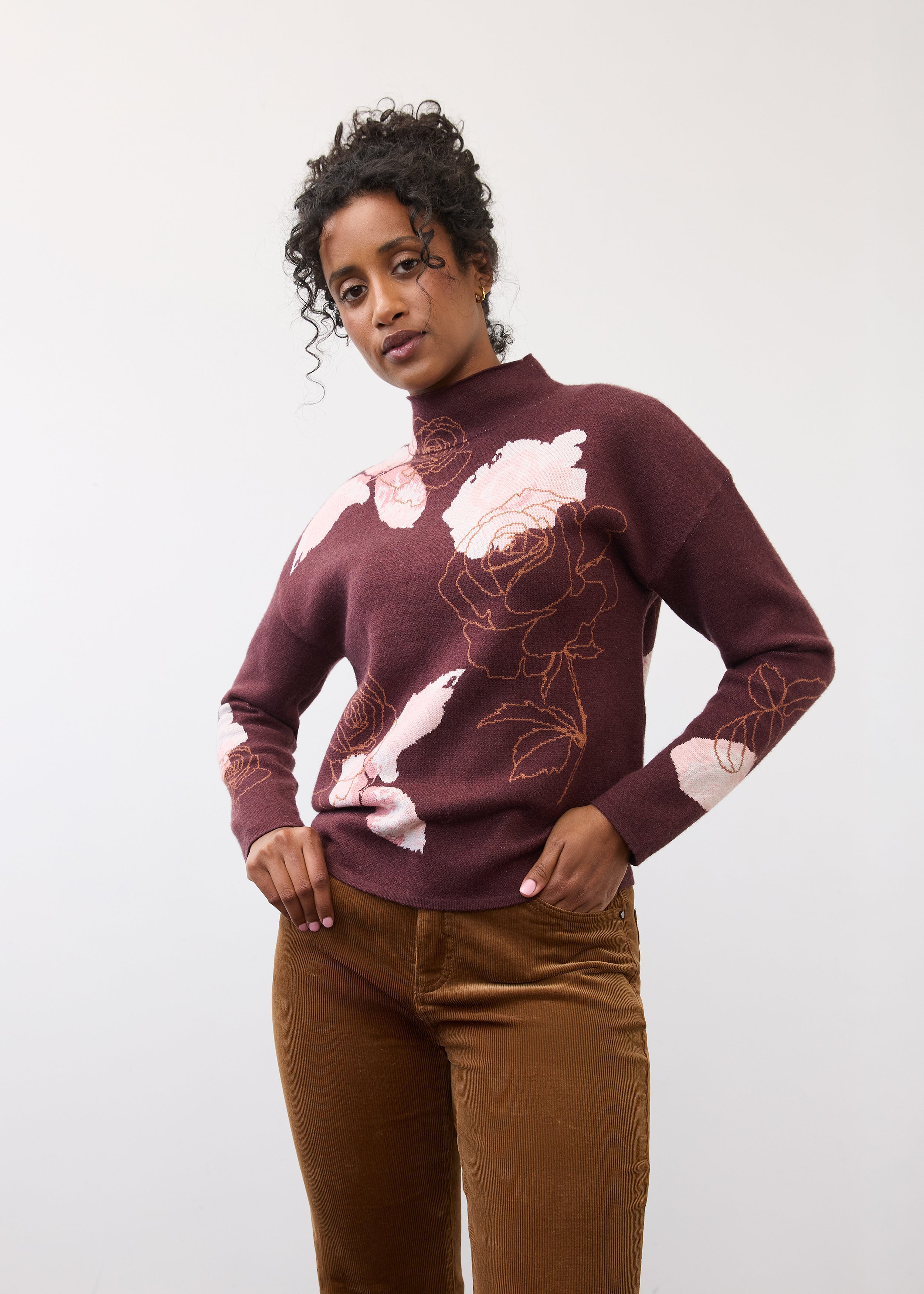 Front view of floral burgundy sweater with pink rose pattern and long sleeves by French Dressing Jeans (FDJ)